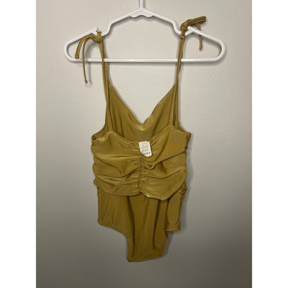 Kate Quinn Gold Swimsuit - Picture 2 of 2